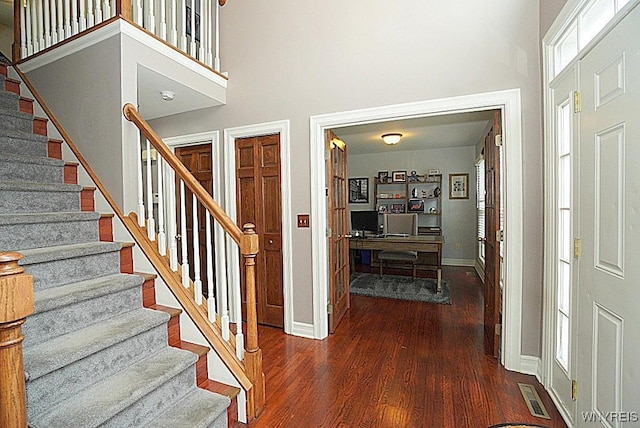 47 Timber Cove Ct, Amherst, NY 14051 - foyer entrance featuring a towering ceiling, wood finished floors, and stairway