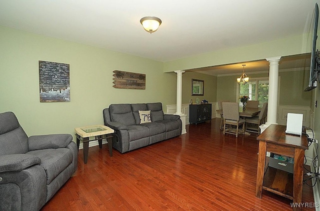 47 Timber Cove Ct, Amherst, NY 14051 - living area with ornate columns, wood finished floors, and a chandelier