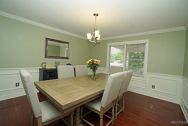 47 Timber Cove Ct, Amherst, NY 14051 - dining area featuring a chandelier, crown molding, dark wood-style flooring, wainscoting, and a decorative wall