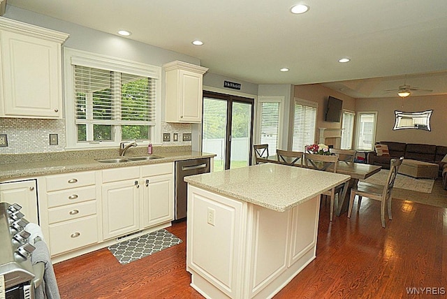 47 Timber Cove Ct, Amherst, NY 14051 - kitchen with dishwasher, dark wood-style flooring, backsplash, recessed lighting, and open floor plan