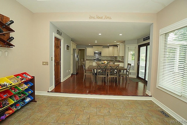 47 Timber Cove Ct, Amherst, NY 14051 - dining room featuring stone finish floors and recessed lighting