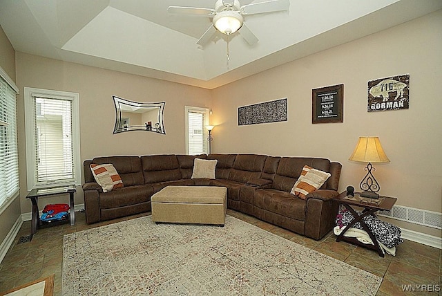 47 Timber Cove Ct, Amherst, NY 14051 - living room with a ceiling fan and stone finish flooring