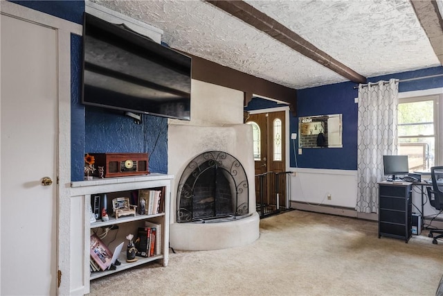 477 Pine Circle Ext, Big Flats, NY 14845 - carpeted living area with a baseboard radiator, a textured ceiling, and beamed ceiling