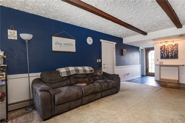477 Pine Circle Ext, Big Flats, NY 14845 - living area with wainscoting, carpet flooring, a baseboard heating unit, beam ceiling, and a textured ceiling