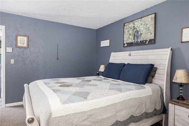 477 Pine Circle Ext, Big Flats, NY 14845 - carpeted bedroom featuring a textured ceiling and baseboards