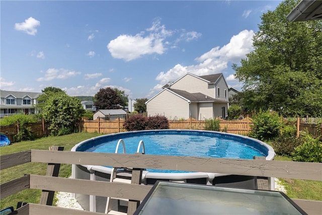 477 Pine Circle Ext, Big Flats, NY 14845 - view of pool featuring a fenced backyard and a residential view