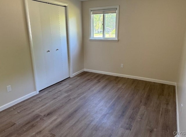 5709 Merry St, Verona, NY 13478 - unfurnished bedroom with wood finished floors and a closet