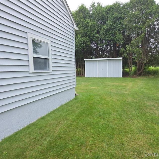 5709 Merry St, Verona, NY 13478 - view of grassy yard featuring an outbuilding