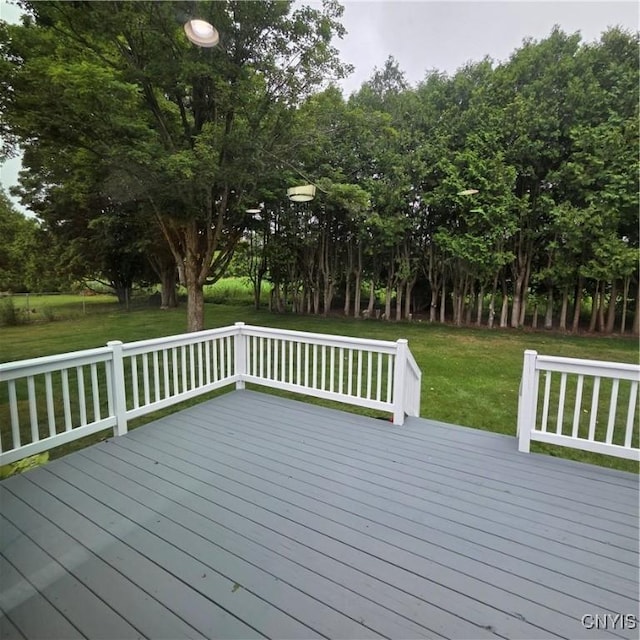 5709 Merry St, Verona, NY 13478 - wooden deck with a lawn and view of wooded area