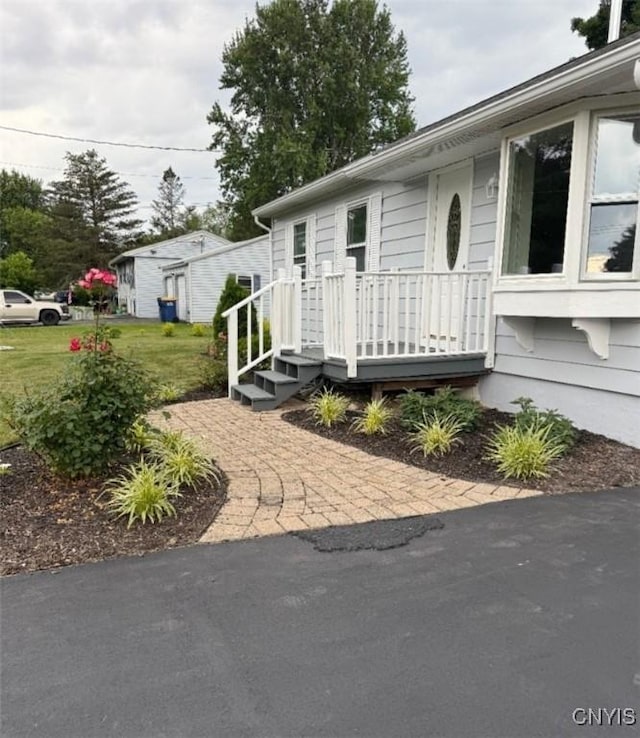 5709 Merry St, Verona, NY 13478 - manufactured / mobile home with a front lawn