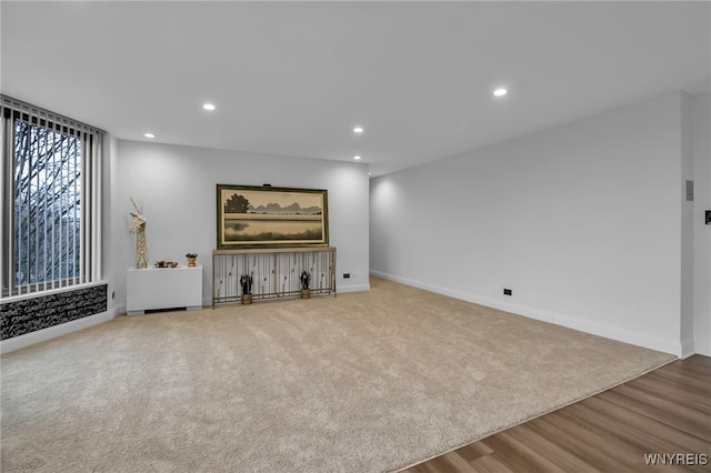 849 Delaware Ave Unit 404, Buffalo, NY 14209 - unfurnished living room featuring wood finished floors and recessed lighting