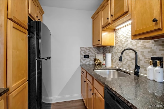 849 Delaware Ave Unit 404, Buffalo, NY 14209 - kitchen featuring black appliances, tasteful backsplash, dark stone countertops, and dark wood-style floors
