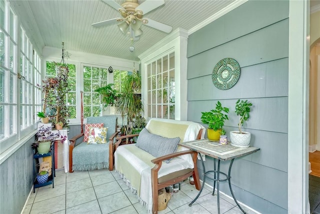 772 Winona Blvd, Irondequoit, NY 14617 - sunroom featuring a ceiling fan, tile patterned flooring, and ornamental molding