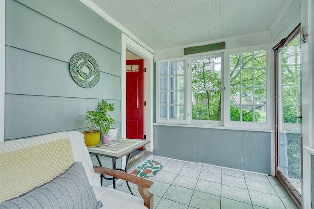772 Winona Blvd, Irondequoit, NY 14617 - sunroom with healthy amount of natural light, tile patterned flooring, and crown molding
