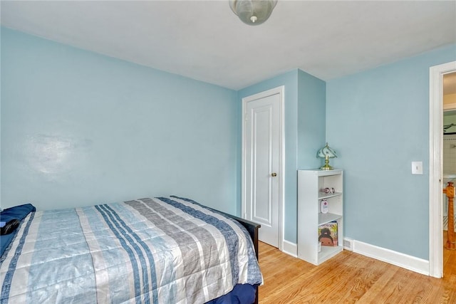 772 Winona Blvd, Irondequoit, NY 14617 - bedroom featuring light wood-type flooring and baseboards