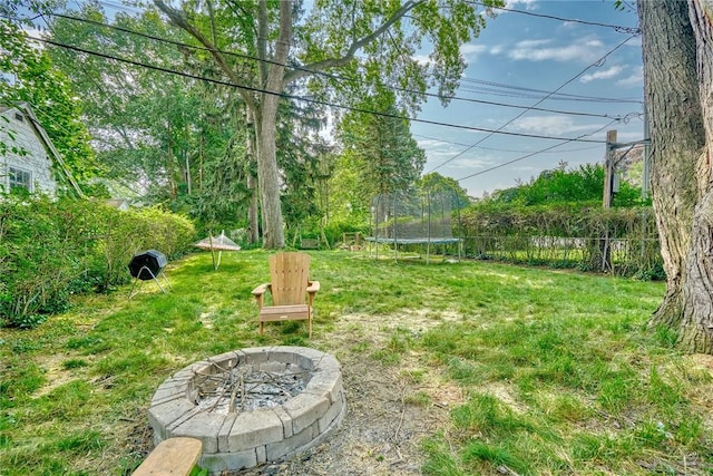 772 Winona Blvd, Irondequoit, NY 14617 - view of yard with a trampoline and a fire pit