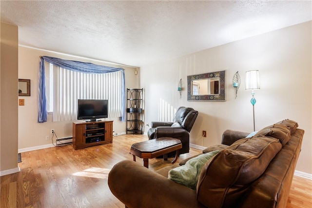 80 Autumn Chapel Way, Chili, NY 14624 - living area featuring a baseboard radiator, light wood-style flooring, and a textured ceiling