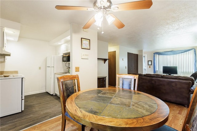 80 Autumn Chapel Way, Chili, NY 14624 - dining space featuring a ceiling fan and dark wood finished floors