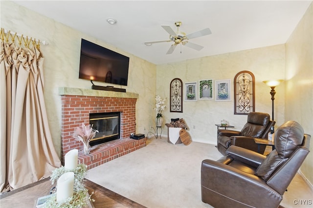 7619 Pico Ln, Lysander, NY 13027 - living room with a ceiling fan, a brick fireplace, and carpet flooring