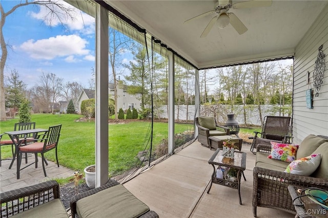 7619 Pico Ln, Lysander, NY 13027 - sunroom with a ceiling fan and an outdoor living space