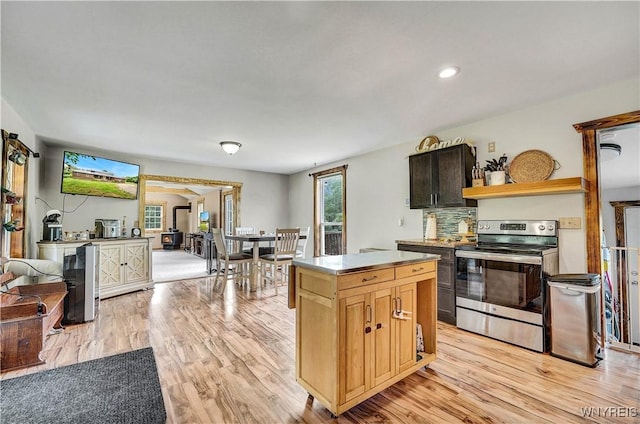 2890 Eagles Nest Rd, Yorkshire, NY 14042 - kitchen featuring stainless steel electric stove, light wood finished floors, open shelves, wine cooler, and a center island