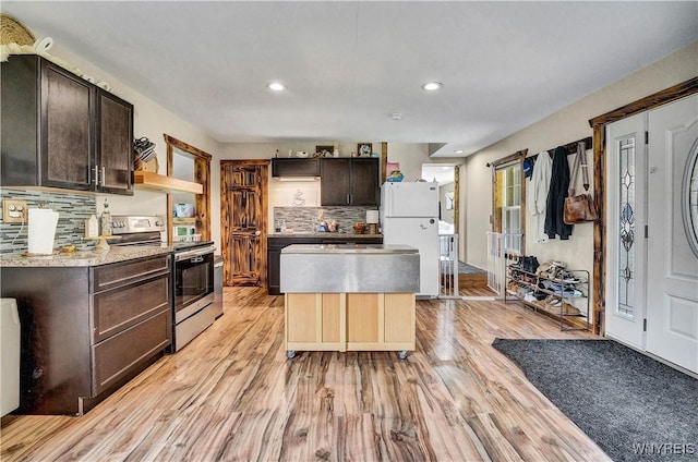 2890 Eagles Nest Rd, Yorkshire, NY 14042 - kitchen featuring stainless steel electric range oven, freestanding refrigerator, dark brown cabinets, light wood-type flooring, and recessed lighting