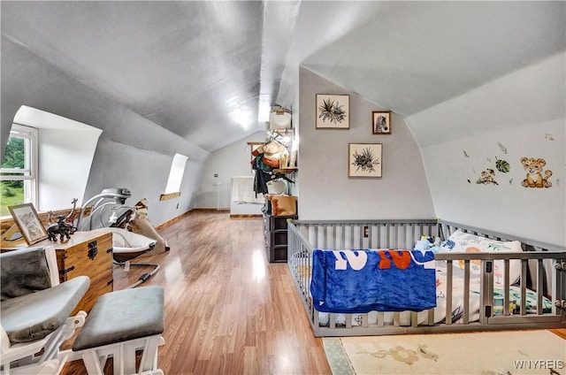 2890 Eagles Nest Rd, Yorkshire, NY 14042 - bedroom featuring wood finished floors and lofted ceiling