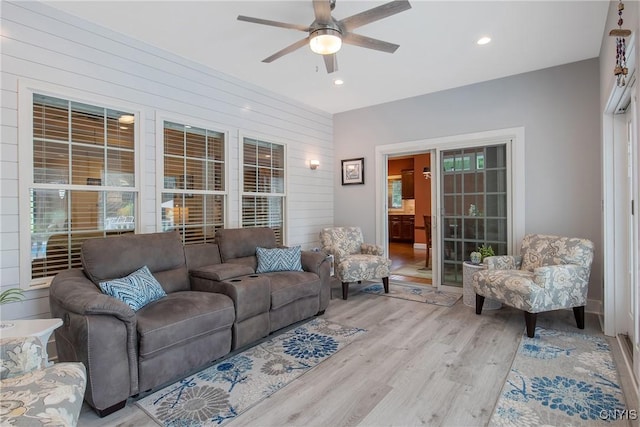 21 Donovan Dr, Oswego, NY 13126 - living area with ceiling fan, wood finished floors, recessed lighting, and wooden walls