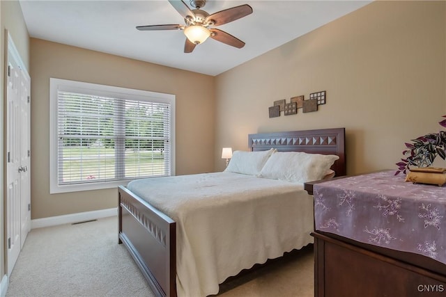 21 Donovan Dr, Oswego, NY 13126 - bedroom with light carpet and ceiling fan