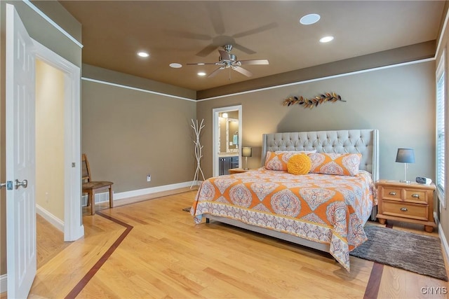 21 Donovan Dr, Oswego, NY 13126 - bedroom featuring wood finished floors, recessed lighting, ensuite bath, and a ceiling fan