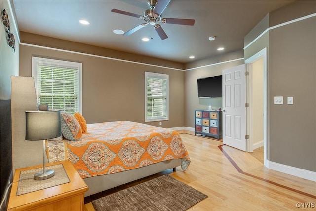21 Donovan Dr, Oswego, NY 13126 - bedroom with light wood-style flooring, multiple windows, recessed lighting, and a ceiling fan