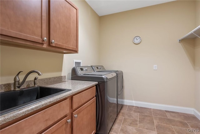 21 Donovan Dr, Oswego, NY 13126 - washroom with washing machine and clothes dryer and cabinet space