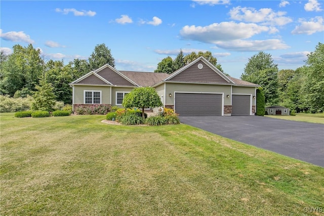 21 Donovan Dr, Oswego, NY 13126 - craftsman-style home featuring an attached garage, driveway, and a front yard