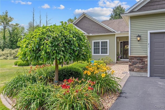 21 Donovan Dr, Oswego, NY 13126 - entrance to property featuring a lawn