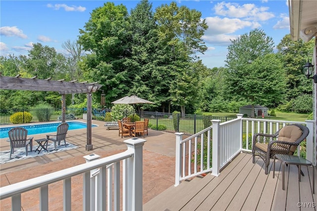 21 Donovan Dr, Oswego, NY 13126 - wooden deck featuring a patio, a storage unit, and a pergola