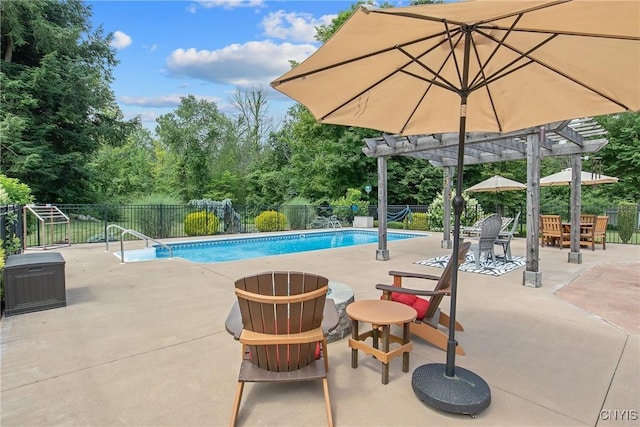 21 Donovan Dr, Oswego, NY 13126 - view of swimming pool featuring a pergola, a patio area, and view of wooded area