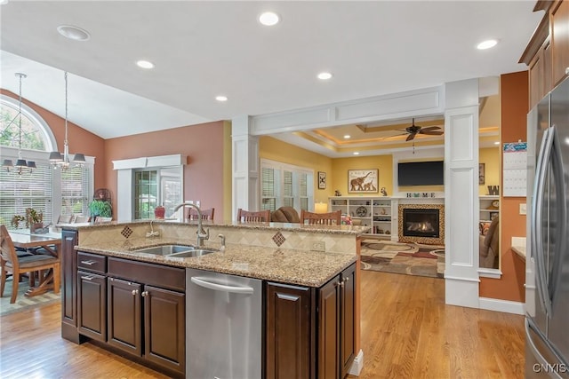21 Donovan Dr, Oswego, NY 13126 - kitchen with stainless steel appliances, a ceiling fan, light wood-style floors, open floor plan, and recessed lighting