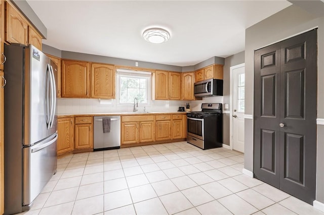 263 Volk Rd, Webster, NY 14580 - kitchen with stainless steel appliances and light countertops
