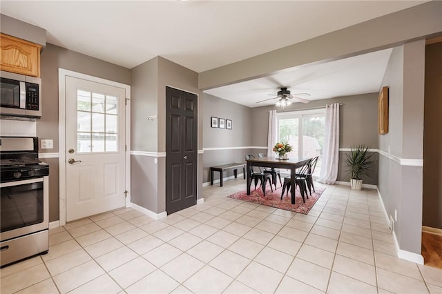263 Volk Rd, Webster, NY 14580 - dining area with a ceiling fan and light tile patterned flooring