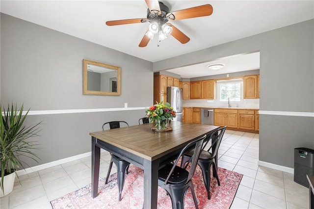 263 Volk Rd, Webster, NY 14580 - dining space with ceiling fan and light tile patterned floors