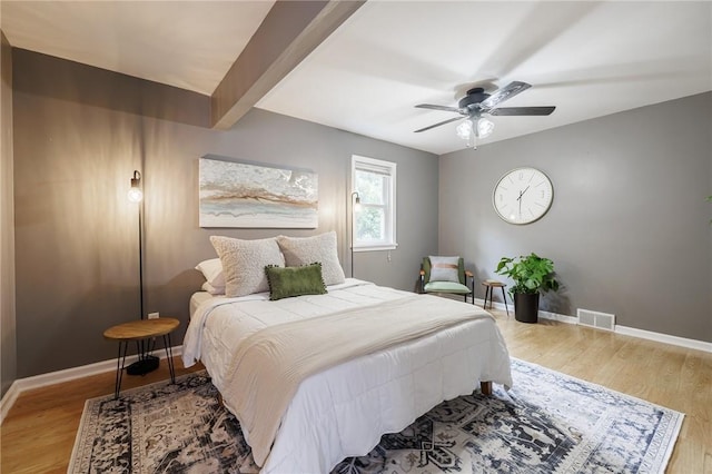 263 Volk Rd, Webster, NY 14580 - bedroom with wood finished floors, ceiling fan, and beamed ceiling