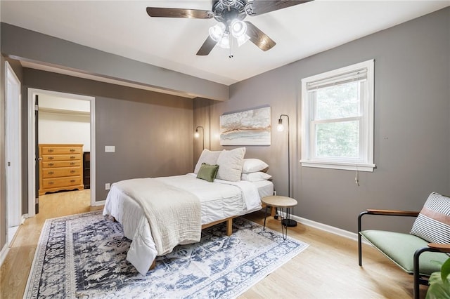 263 Volk Rd, Webster, NY 14580 - bedroom with light wood-style floors and a ceiling fan