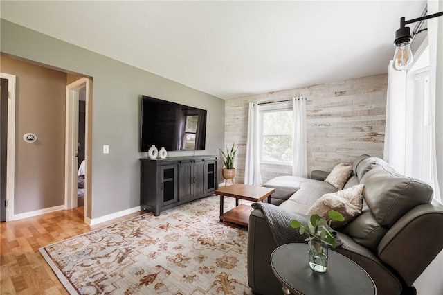 263 Volk Rd, Webster, NY 14580 - living area featuring an accent wall and light wood-style flooring