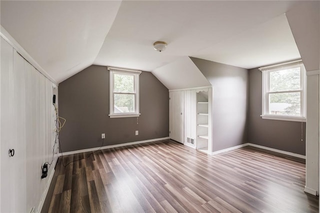 263 Volk Rd, Webster, NY 14580 - bonus room featuring wood finished floors and vaulted ceiling