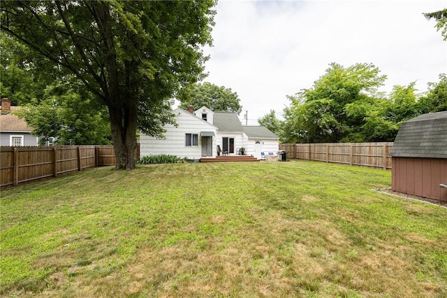 263 Volk Rd, Webster, NY 14580 - fenced backyard featuring a wooden deck and a shed