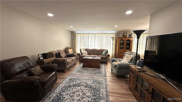 1330 Maple Rd Unit 4, Amherst, NY 14221 - living area with wood finished floors and recessed lighting