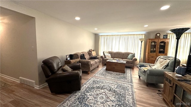 1330 Maple Rd Unit 4, Amherst, NY 14221 - living room featuring wood finished floors and recessed lighting