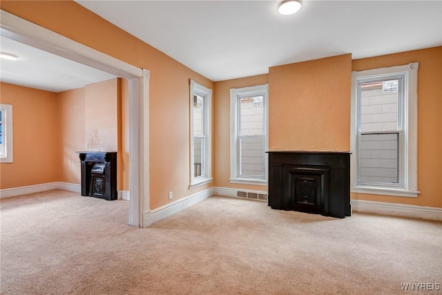 285 E N St Unit S, Buffalo, NY 14204 - unfurnished living room with carpet and baseboards