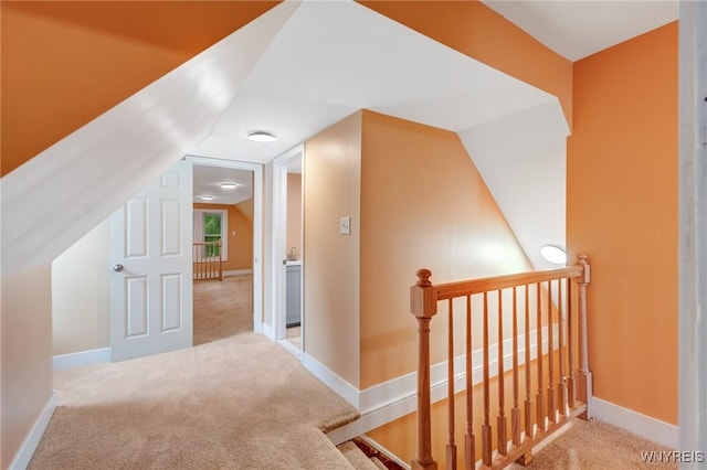 285 E N St Unit S, Buffalo, NY 14204 - hallway with an upstairs landing, carpet flooring, and vaulted ceiling