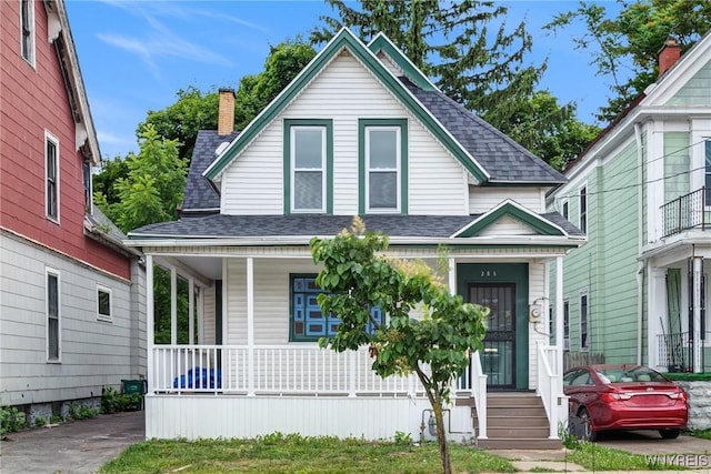285 E N St Unit S, Buffalo, NY 14204 - view of front of house with covered porch and roof with shingles